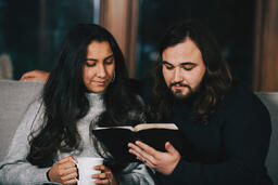 Husband and Wife Reading the Bible Together  image 2