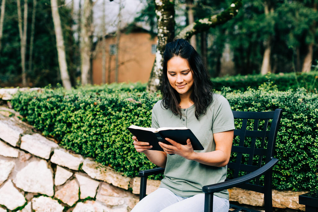Woman Reading the Bible on the Patio Outside large preview
