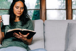 Woman Reading the Bible and Drinking Coffee  image 2