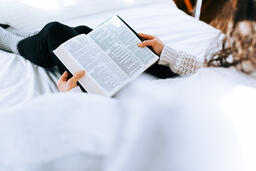Woman Reading the Bible in Bed  image 2
