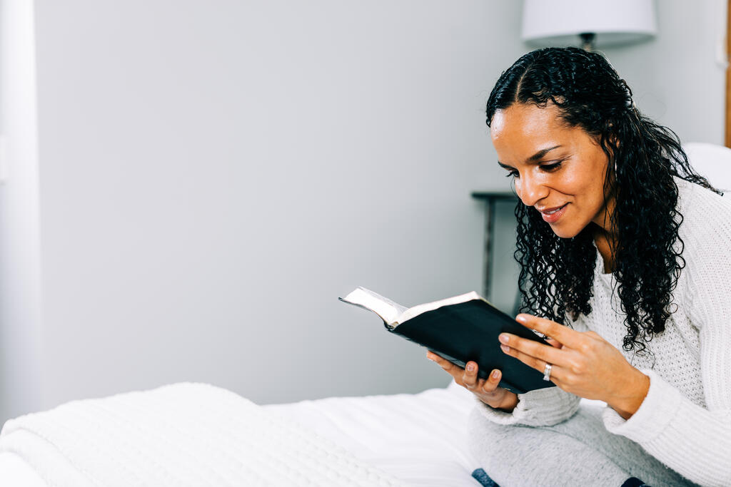 Woman Reading the Bible in Bed large preview