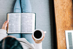 Woman Reading the Bible with a Cup of Coffee  image 1