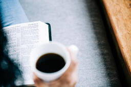 Woman Reading the Bible with a Cup of Coffee  image 1