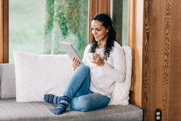 Woman Reading on a Tablet  image 3