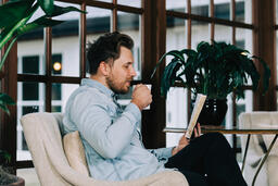Man Reading the Bible with a Cup of Coffee  image 5