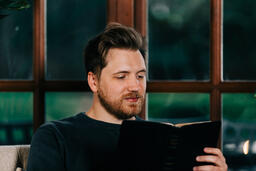 Man Reading the Bible with a Cup of Coffee  image 2