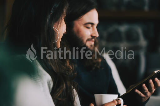 Husband and Wife Reading the Bible Together