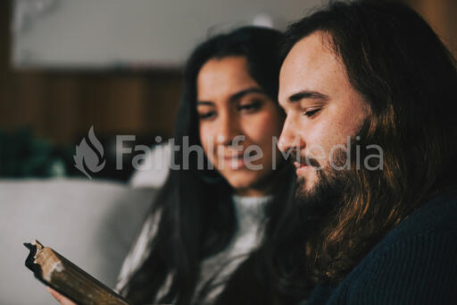 Husband and Wife Reading the Bible Together