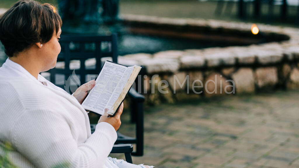 Woman Reading The Bible On The Patio Outside Graphics For The Church