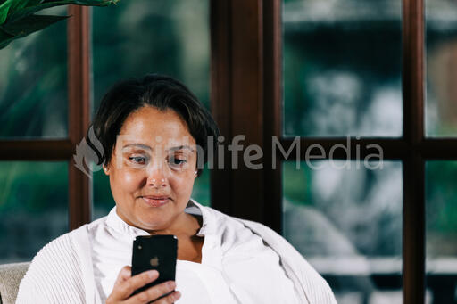 Woman Looking at Her Phone