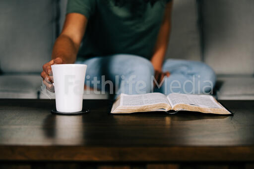 Woman Grabbing Her Bible for Devotions