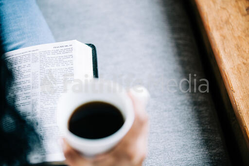 Woman Reading the Bible with a Cup of Coffee