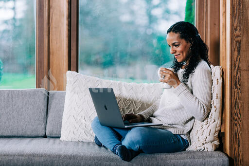 Woman Working on a Laptop