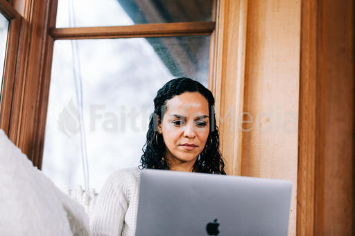 Woman Working on a Laptop