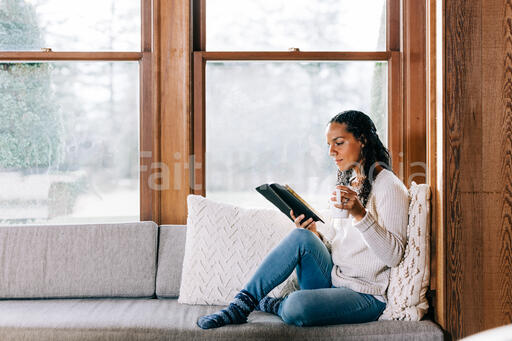 Woman Reading the Bible with a Cup of Coffee