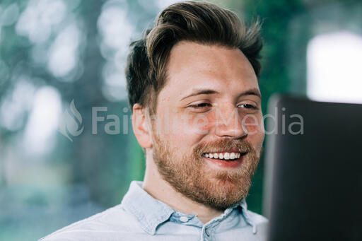 Man Working on a Laptop