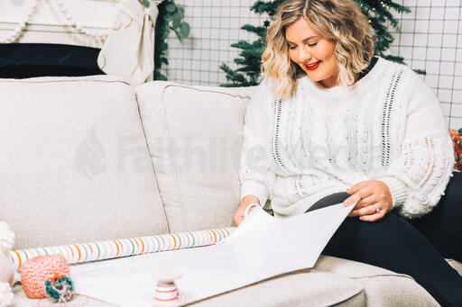 Woman Wrapping a Christmas Present