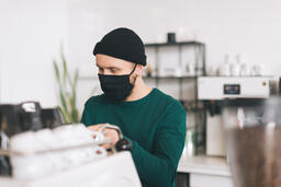 Barista Wearing a Mask and Making Coffee  image 3