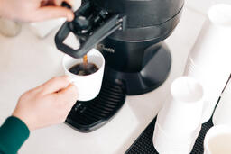 Barista Pouring Drip Coffee  image 1
