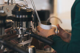 Barista Steaming Milk for a Latte  image 2
