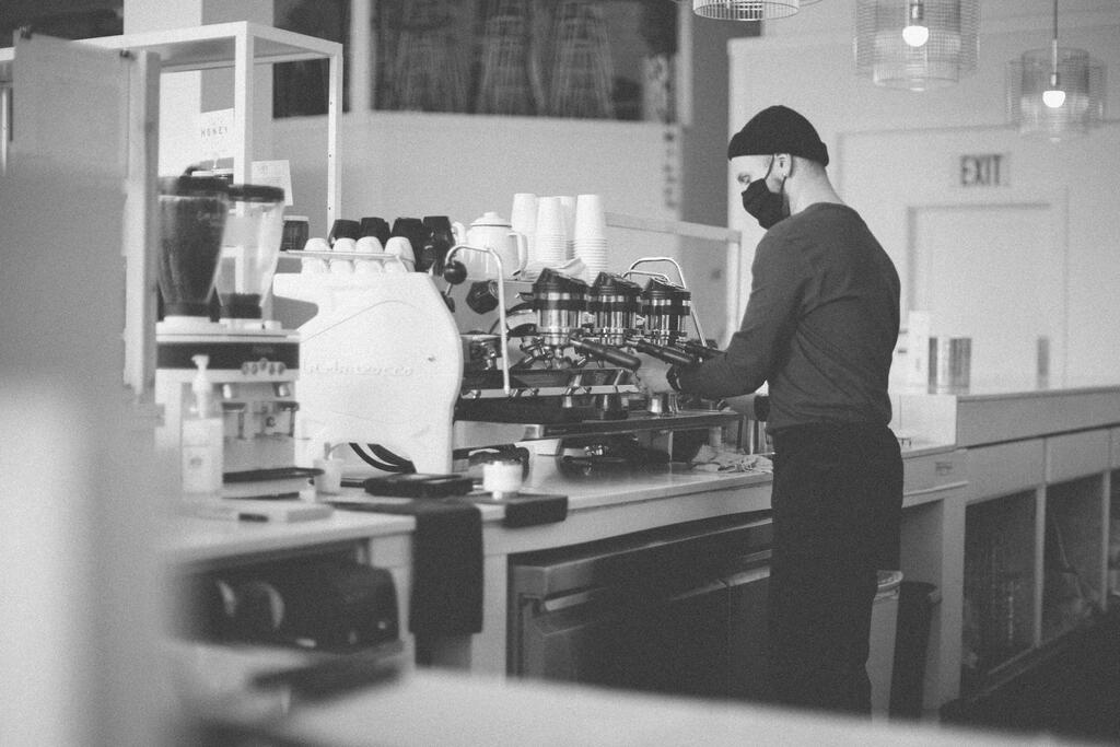 Barista Wearing a Mask and Making Coffee large preview