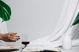 Wafers, Wine, and Bible on Table  image 2