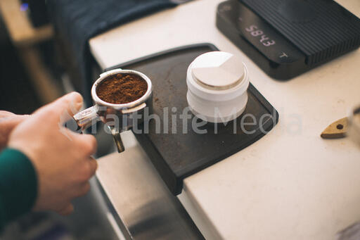 Barista Preparing to Pull Shots of Espresso with a Portafilter