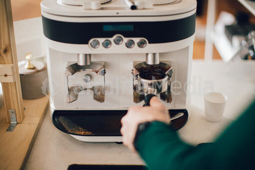 Barista Preparing to Pull Shots of Espresso with a Portafilter