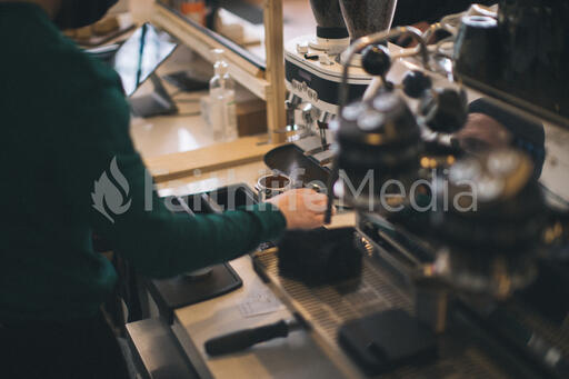 Barista Preparing to Pull Shots of Espresso with a Portafilter