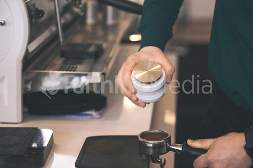 Barista Preparing to Pull Shots of Espresso with a Portafilter