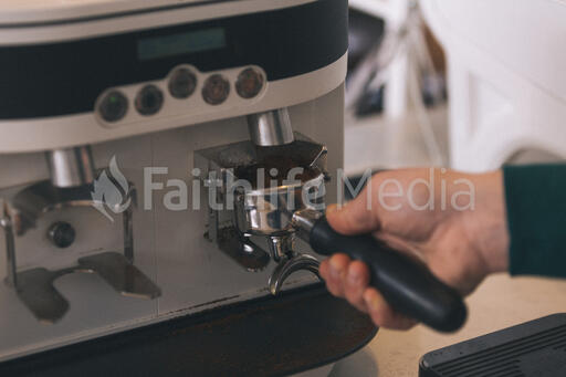 Barista Preparing to Pull Shots of Espresso with a Portafilter