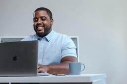 Man Working on Laptop in Office  image 4