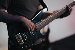 Worship Team Member Playing Bass Guitar  image 1