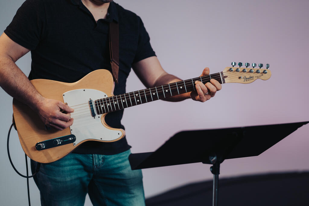 Worship Team Member Playing Electric Guitar large preview