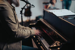 Worship Leader Singing and Playing Piano  image 2