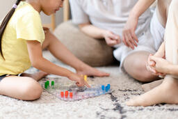 Family Playing Together in the Living Room  image 3