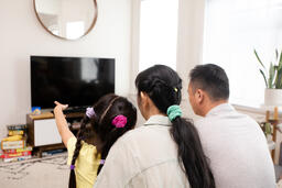 Family Watching TV Together  image 10