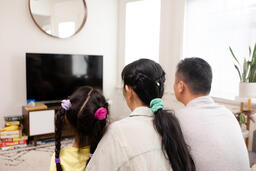 Family Watching TV Together  image 9