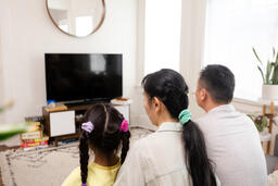 Family Watching TV Together  image 8