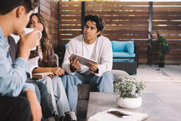 College Group Having Bible Study Together  image 4