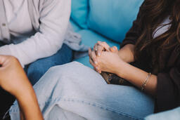 Woman with Hands Folded in Prayer  image 1