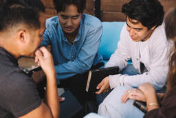 College Group Praying Together  image 1