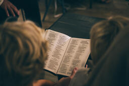 Young Family doing Devotions Together  image 3