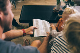 Young Family doing Devotions Together  image 2