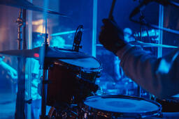 Drummer on Stage During Worship Service  image 1