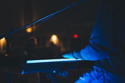 Worship Team Member Playing Keyboard on Stage  image 2