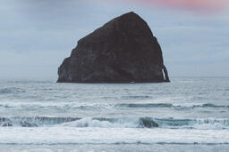 Large Rock in the Midst of an Ocean  image 1