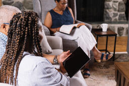 Multi-Generational Family Doing Devotions Together  image 2