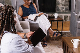 Multi-Generational Family Doing Devotions Together  image 1