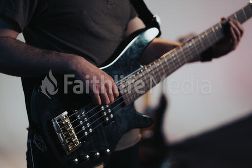 Worship Team Member Playing Bass Guitar